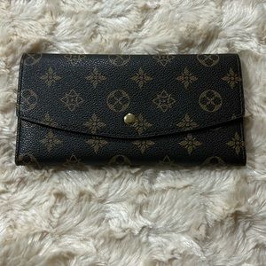 Brand new without tags. Brown wallet.